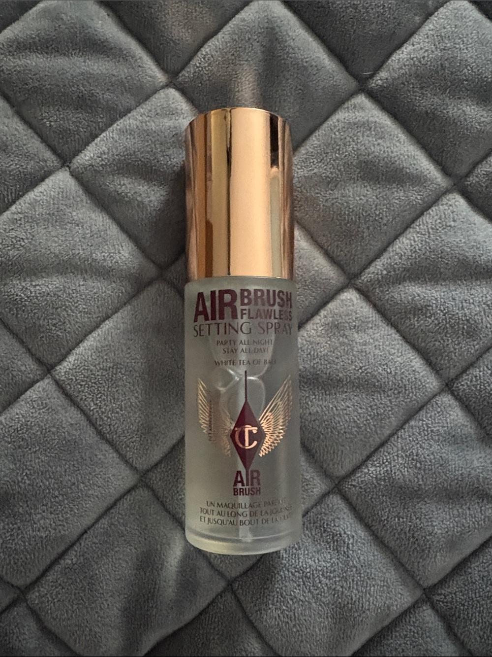 Charlotte Tilbury Airbrush Flawless Setting Spray — Rose Gold Cap, Clear Bottle